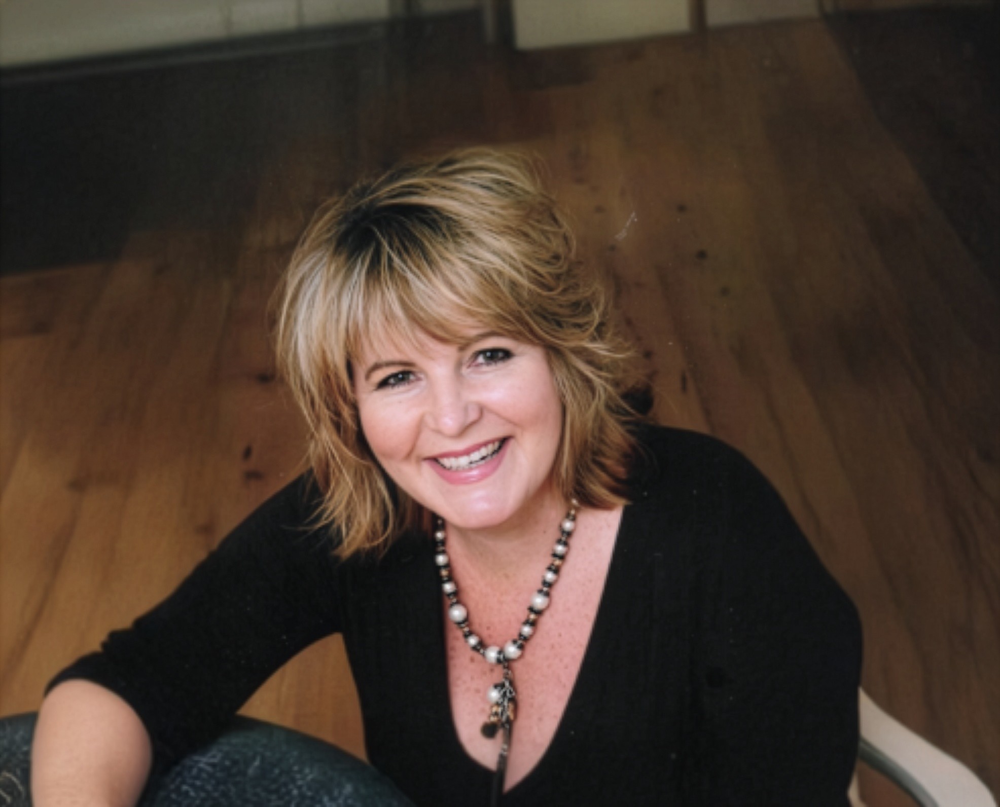 Beverly Jeursen assisting a client
